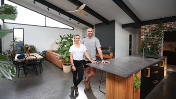 Anneleise Carratt and Jarrod Thompson in their sustainable home. Picture by Adam McLean